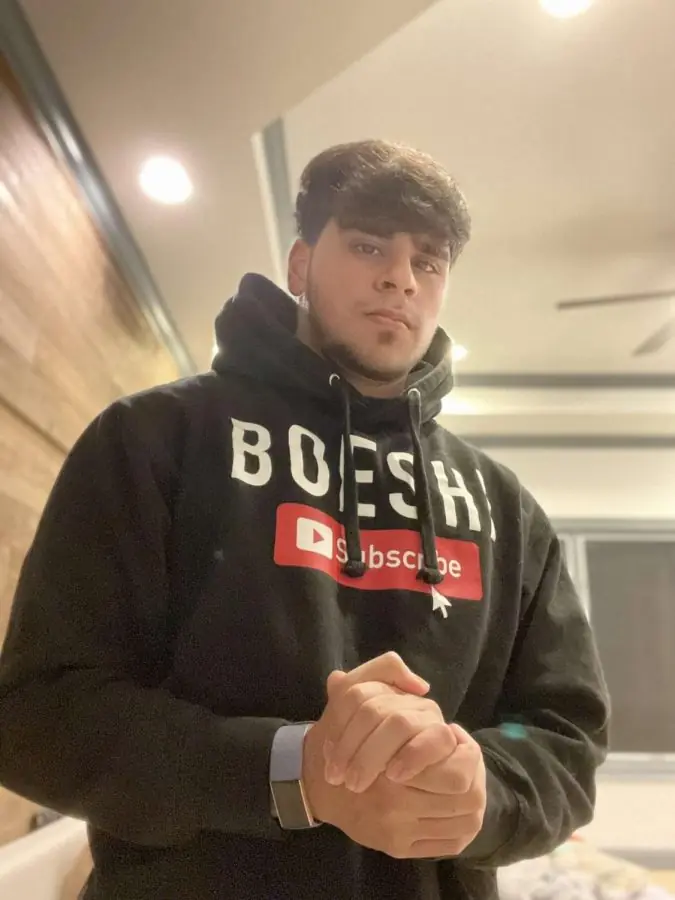 Boeshi before training seriously, wearing a BOESHI hoodie
